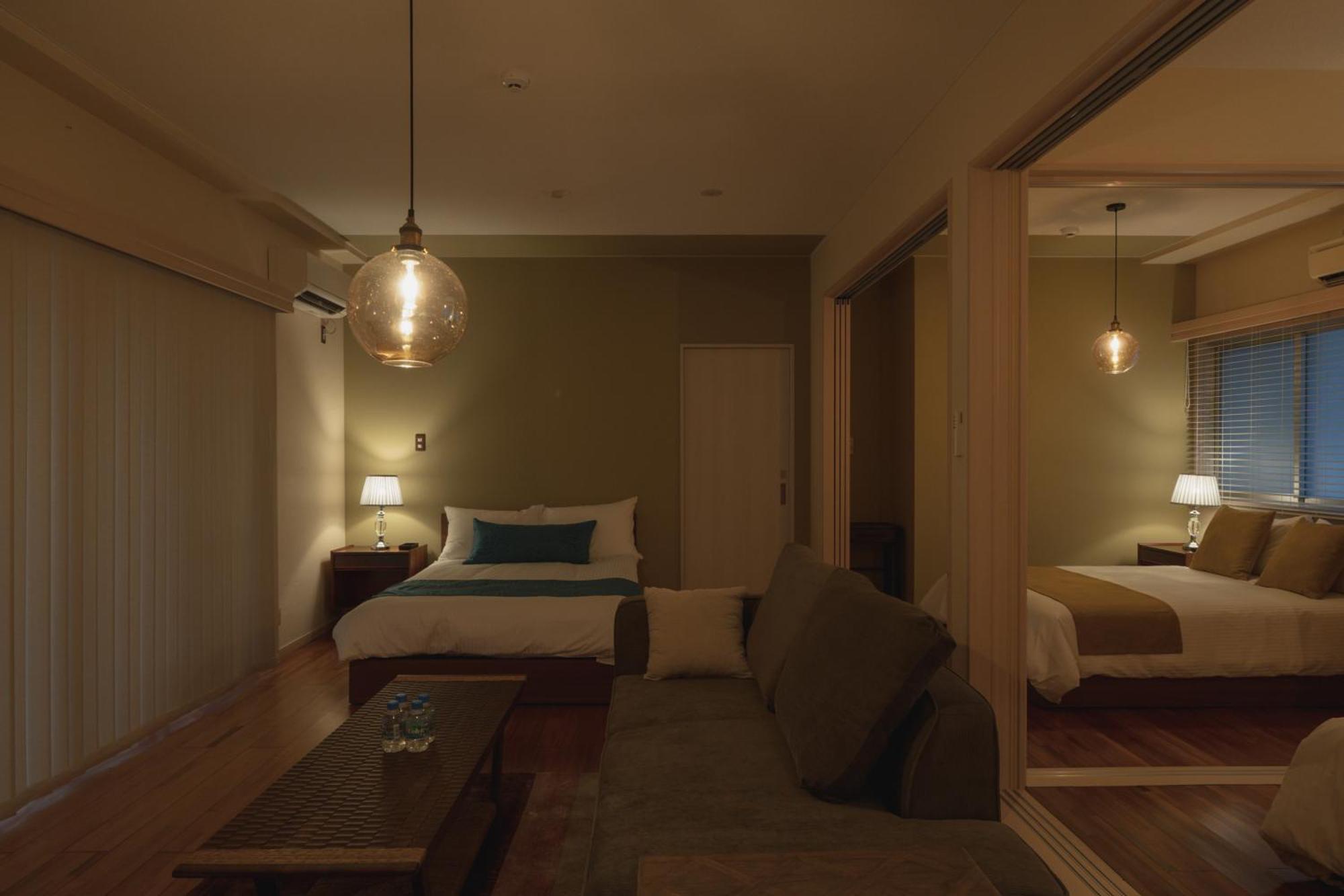 Hotel Mtb Motobu Habitación foto